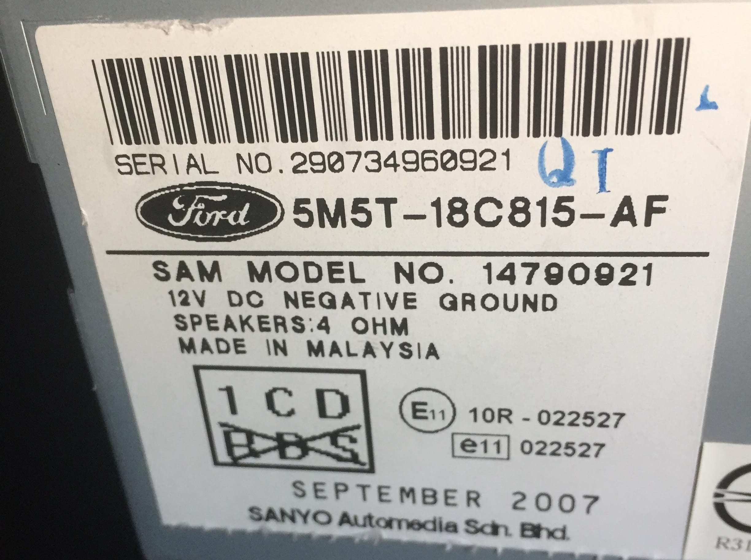 Panasonic Ford radio label with a 12 digit serial number