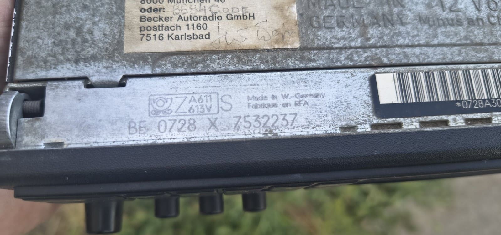Becker Bavaria C serial number label with the BE prefix on a BMW radio