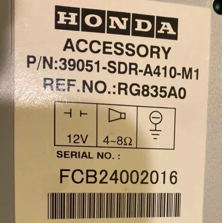 Honda radio serial number white label sticker on metal casing