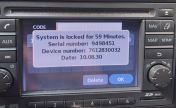 Nissan Connect radio screen showing the serial number