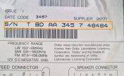 Chrysler RBL Alpine radio label with the TBDAA serial number marked
