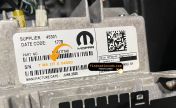 Panasonic Uconnect 8.4 radio label with the TM9 serial number